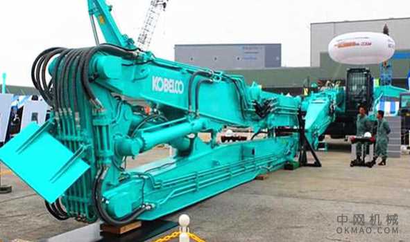 日本发明的拆楼机:机械臂达到65米,20层的建筑物拆卸非常方便 中国机械网,okmao.com