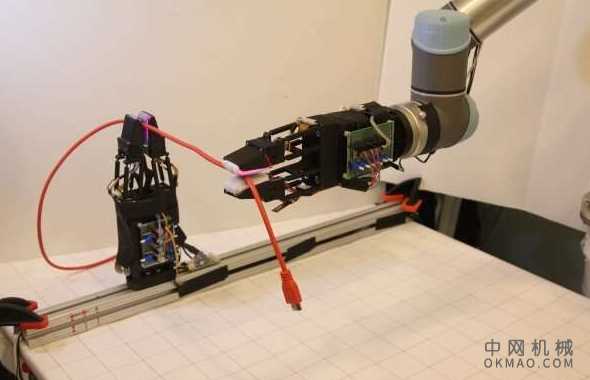 机械手具有柔软灵敏的手指，可以以前所未有的灵活性处理电缆 中国机械网,okmao.com