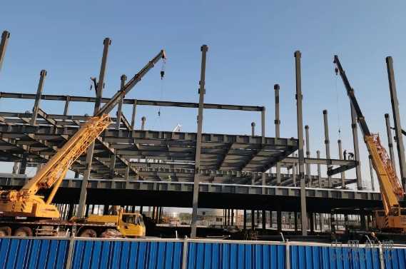 百亿项目新开工!徐工起重机群抢先进岛 中国机械网,okmao.com